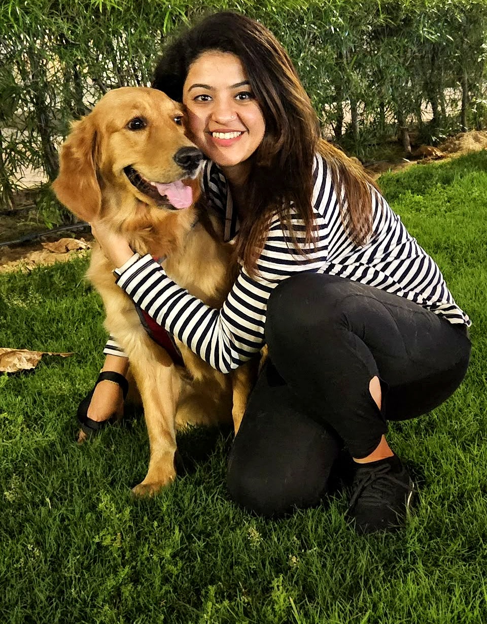 Diksha Mulani with her golden retriever, Red